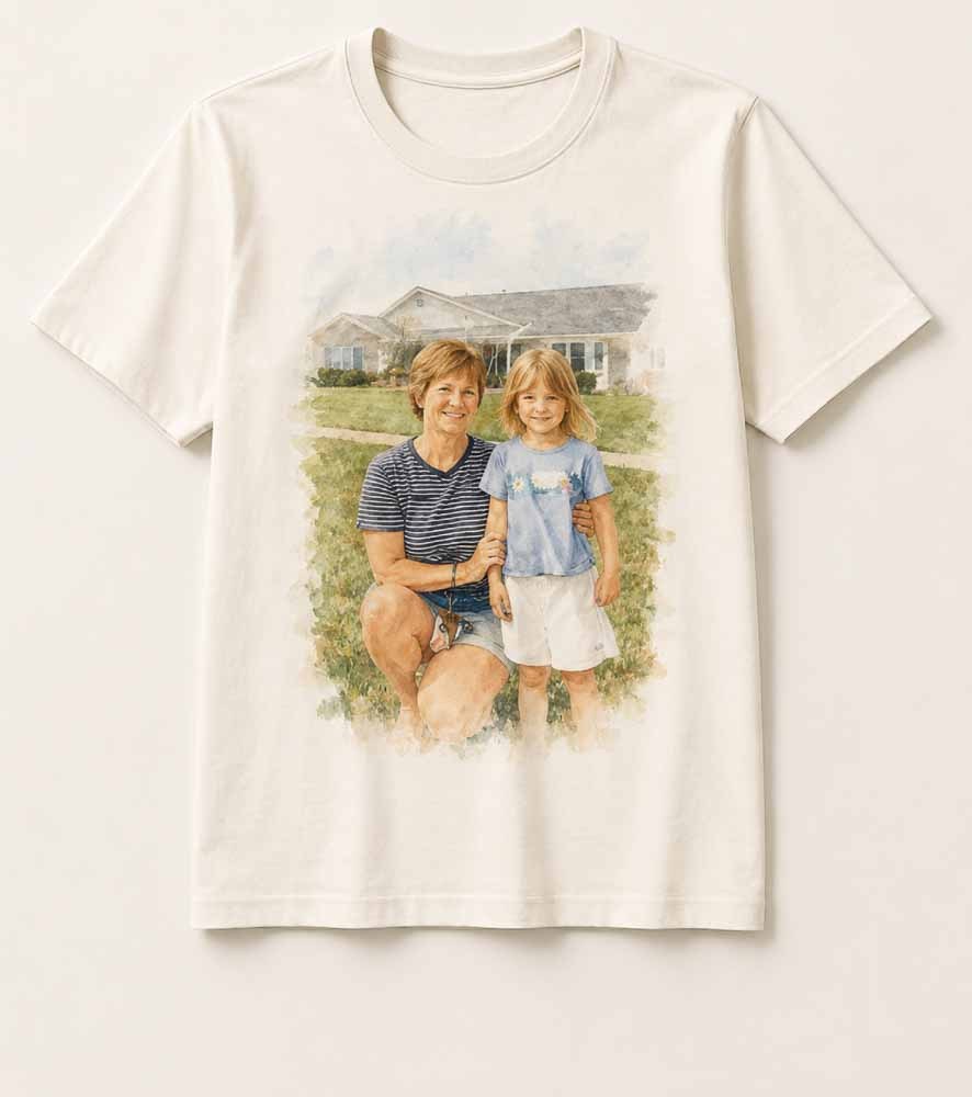 Cream t-shirt printed with a watercolor family portrait in front of a house.