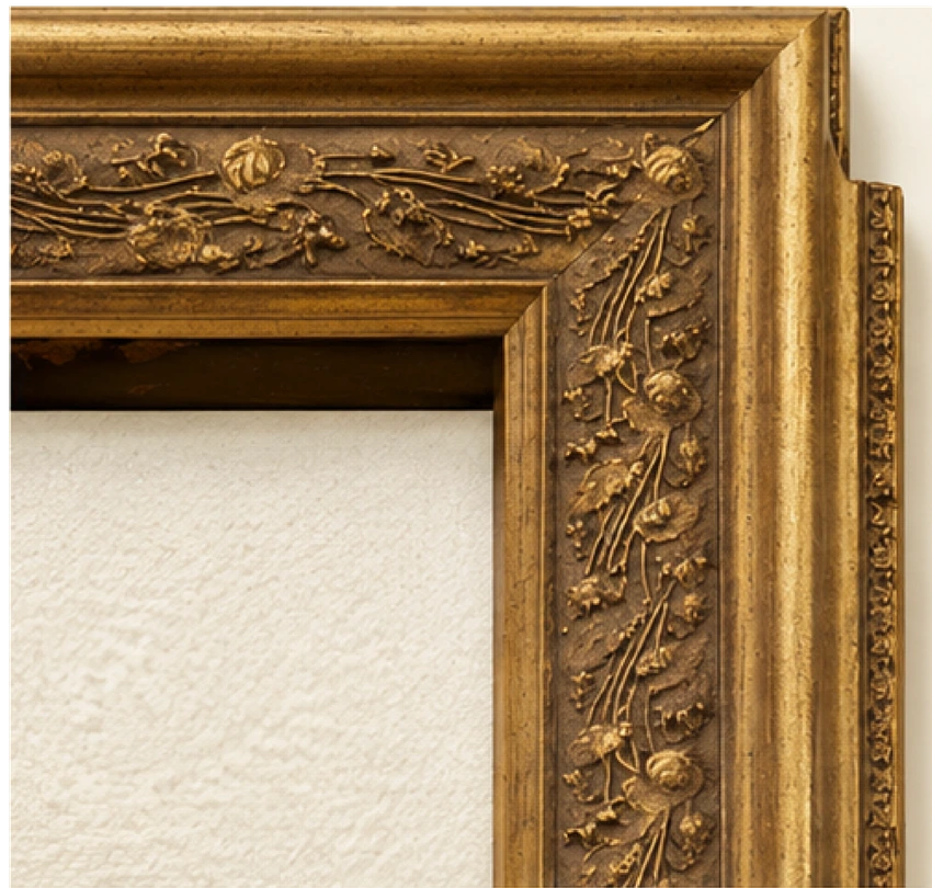 European-style ornate gold portrait frame corner.