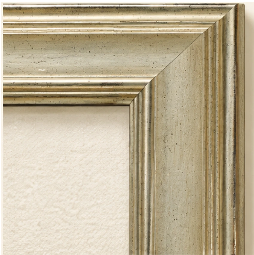 Refined warm-silver picture frame corner.